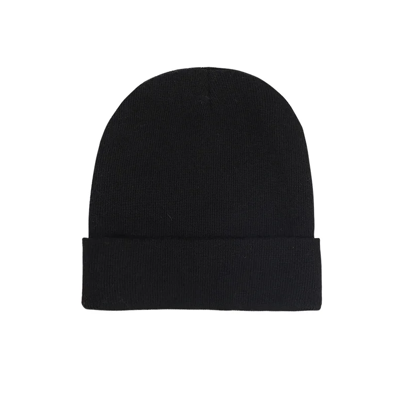 Black plain knit beanie with a folded cuff on white