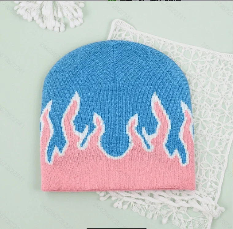 Blue knit beanie with a pink flame border