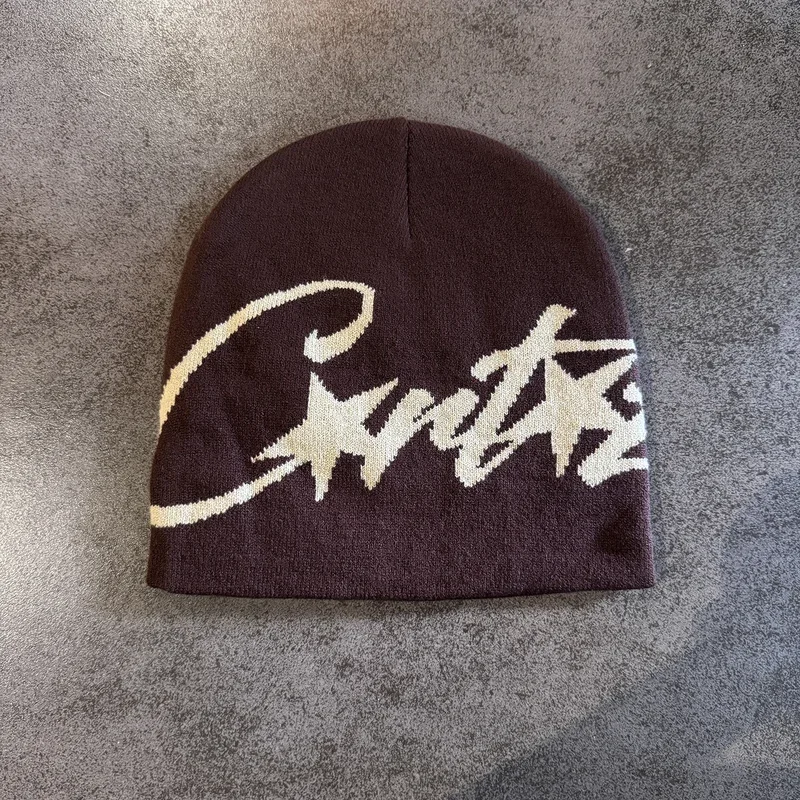 Brown knit beanie with oversized cream script lettering