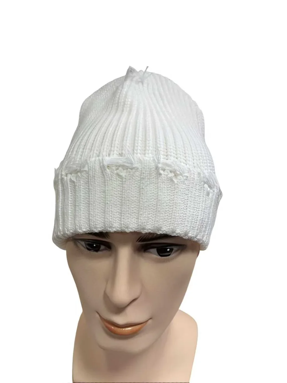 White rib-knit cuffed beanie with intentionally distressed trim, front view on a mannequin.